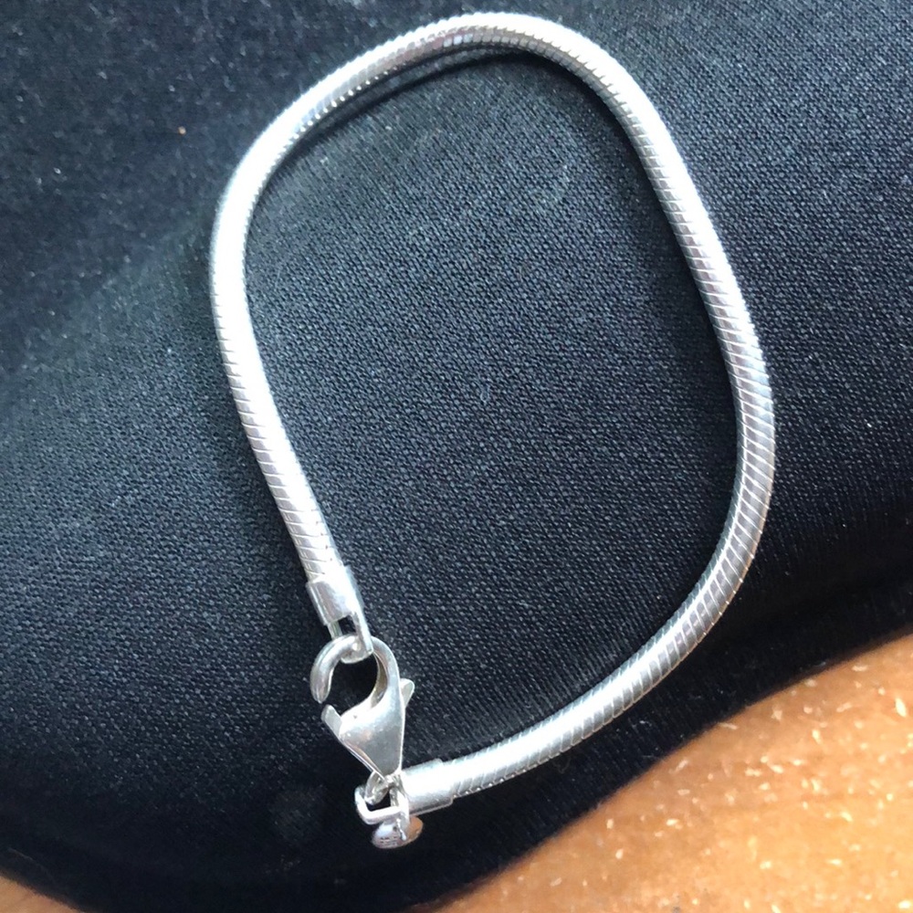 Sterling Silver charm bracelet.